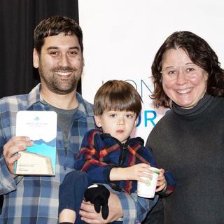 Graham Sakaki receives the award for Leadership & Innovation from VIU President Deb Saucier